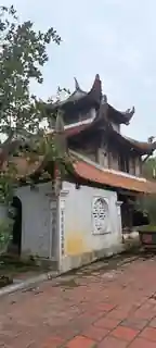 Timber architecture and tiled roofs within the monastic compound.